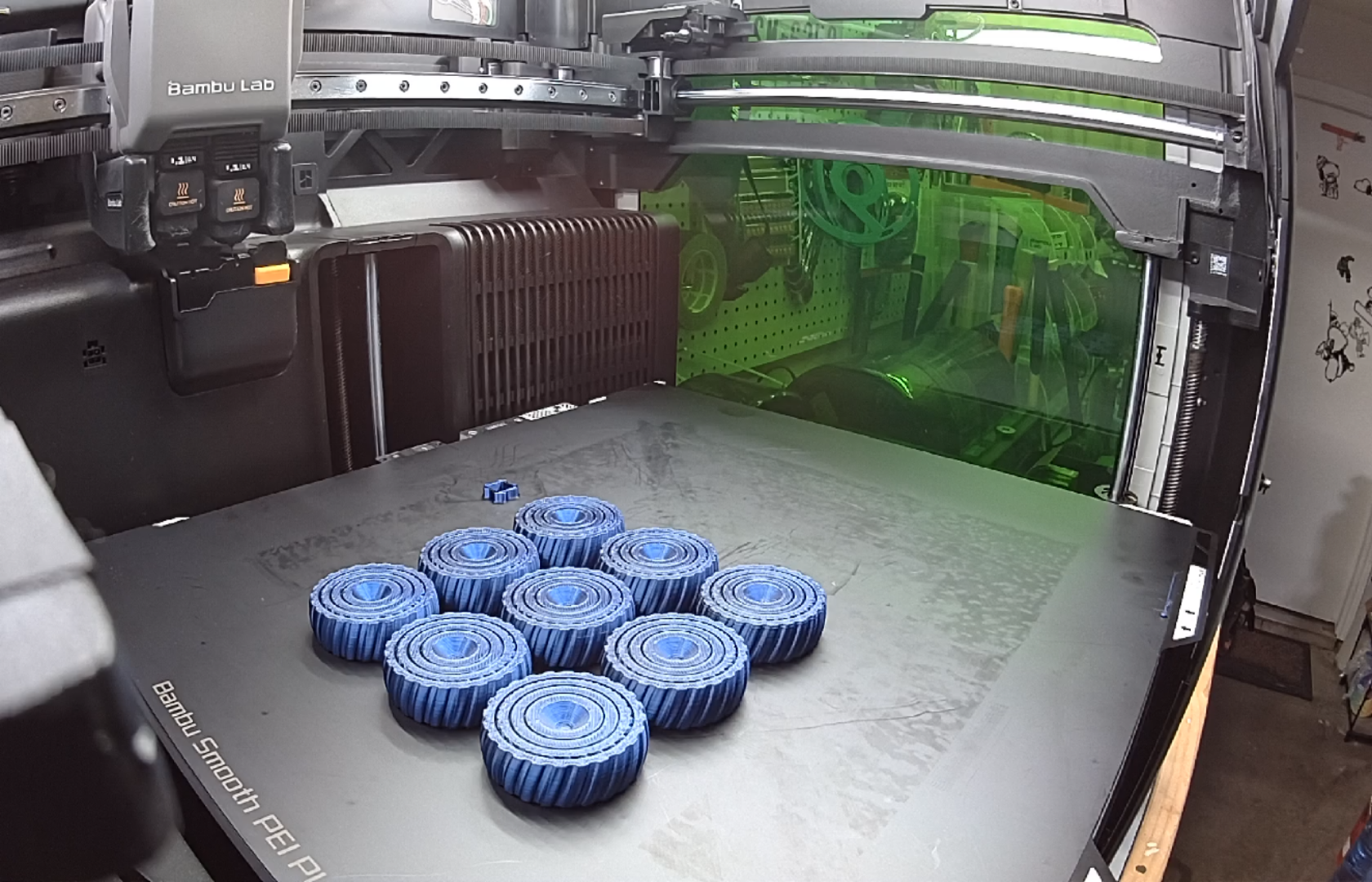 Batch of blue timing pulleys printed together on one plate