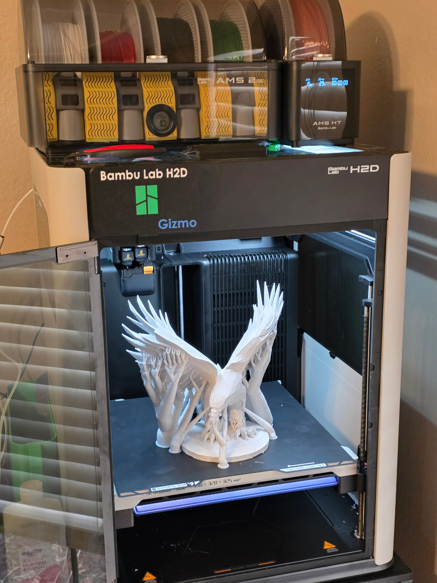 Bambu Lab H2D printing a white eagle sculpture