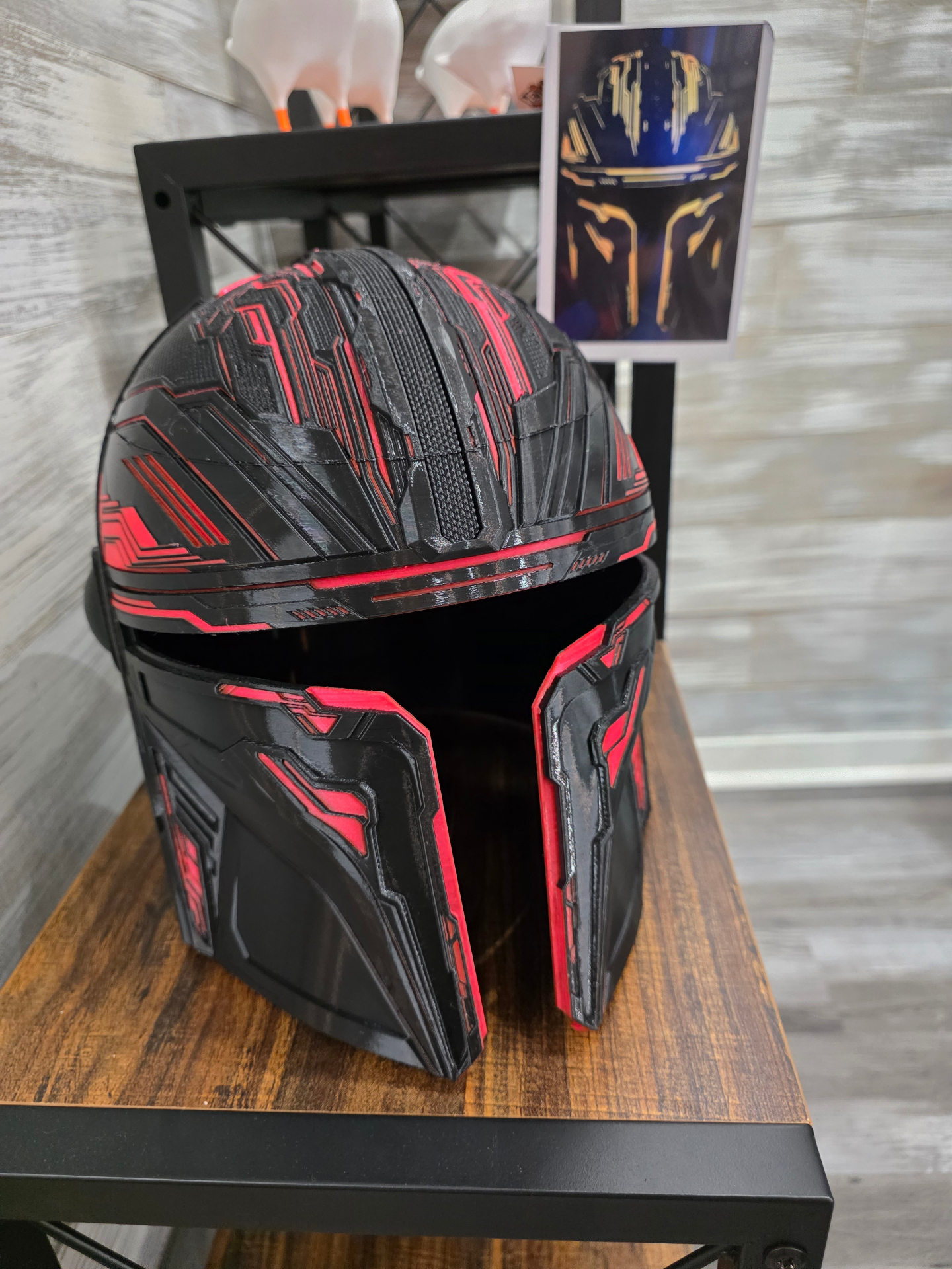 Black and red custom tactical sci-fi helmet with hand painted panel lines